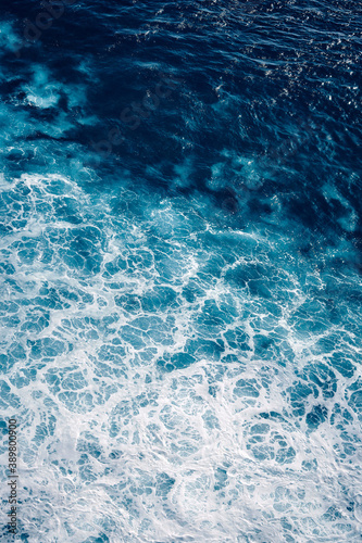 Aerial view to waves in ocean Splashing Waves. Blue clean wavy sea water
