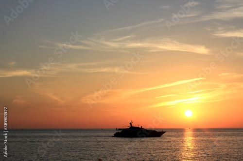 yacht sailing on the black sea with a beautiful sunset © Arina Popkova