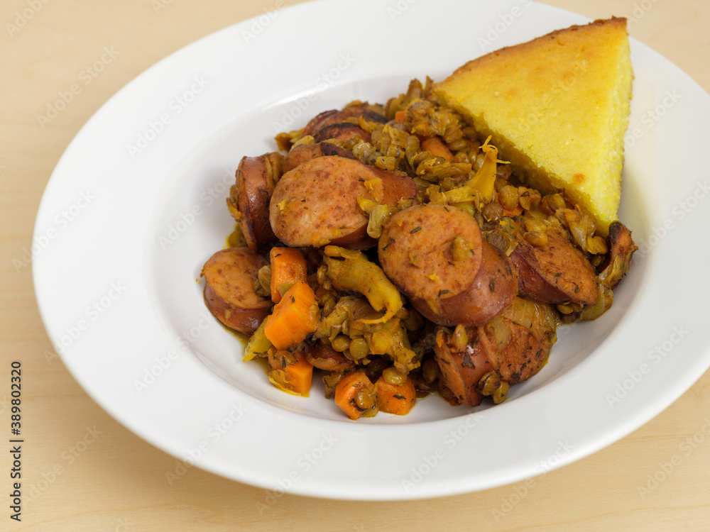 Cassoulet made with kielbasa and lentils with a side of cornbread Cassoulet made with kielbasa and lentils with a side of cornbread