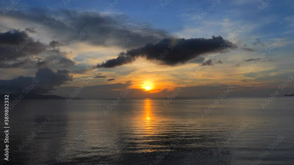 Сalm Sunset time above the ocean, water surface in slow motion at sunset time, nature background static shot Сalm Sunset time above the ocean, water surface in slow motion at sunset time, nature background static shot