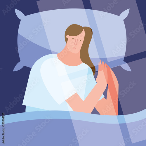 woman in bed suffering from insomnia