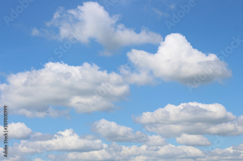 Bright blue sky with white clouds for background or wallpapers