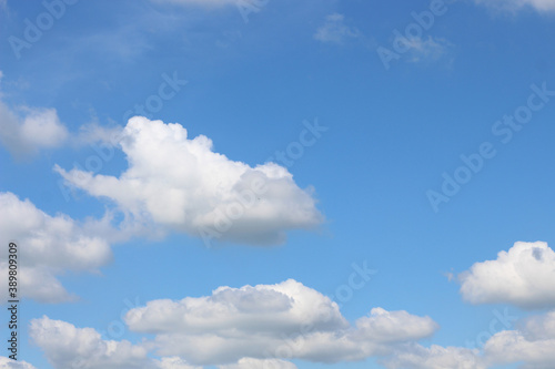 Fototapeta Naklejka Na Ścianę i Meble -  Bright blue sky with white clouds for background or wallpapers
