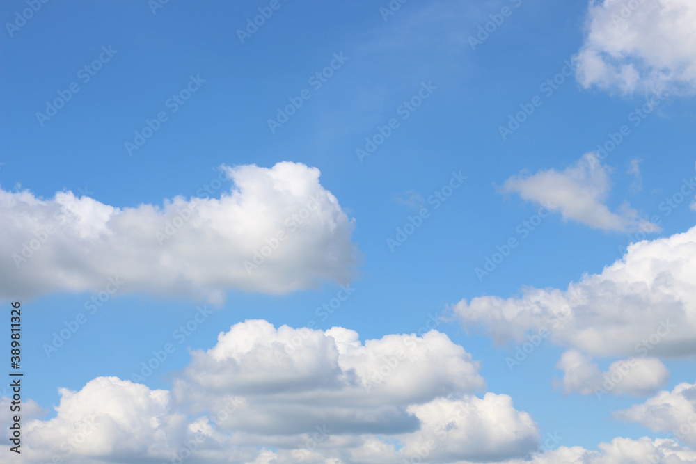 Obraz premium Bright blue sky with white clouds for background or wallpapers