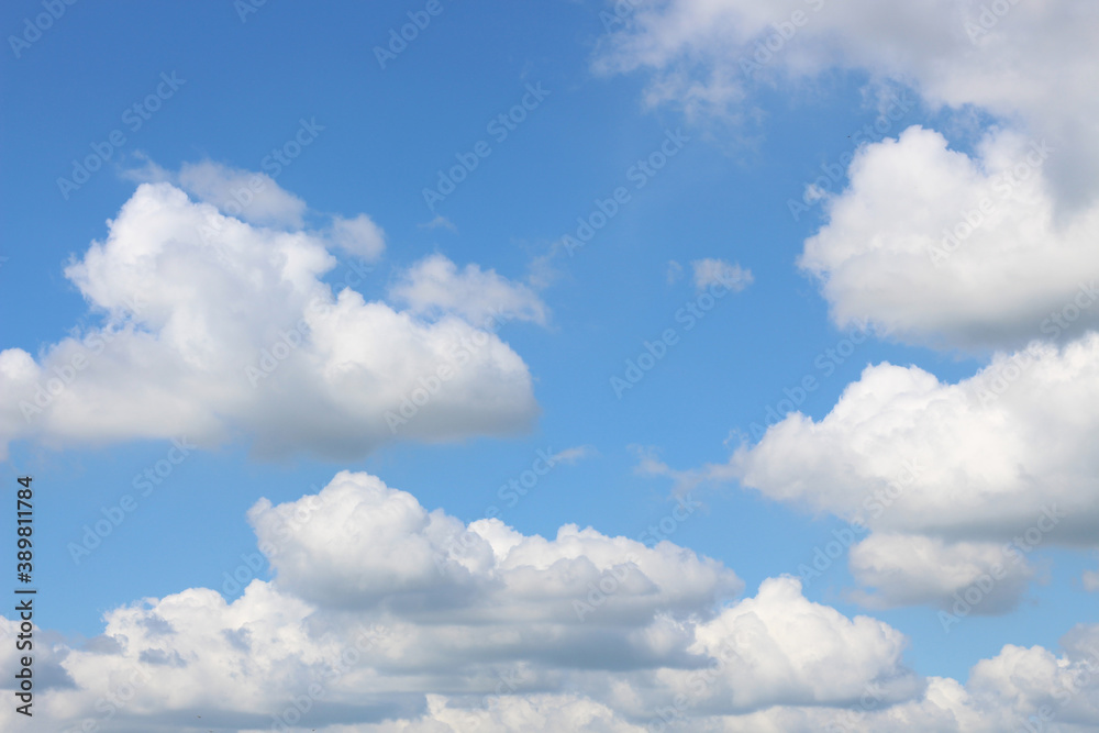 Bright blue sky with white clouds for background or wallpapers Bright blue sky with white clouds for background or wallpapers