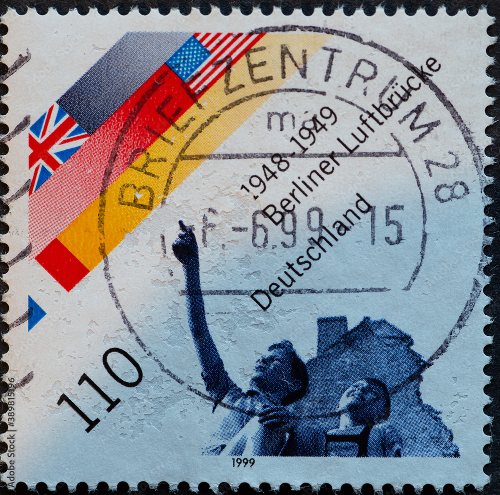 GERMANY - CIRCA 1999 : a postage stamp from Germany, showing the flags ...