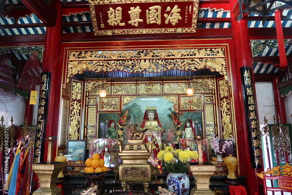 Hoi An, Vietnam, October 29, 2020: Altar in the main hall of the Assembly Hall Of Fujian Chinese Temple in Hoi An