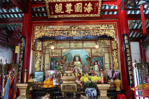 Hoi An, Vietnam, October 29, 2020: Altar in the main hall of the Assembly Hall Of Fujian Chinese Temple in Hoi An © Marco Gallo