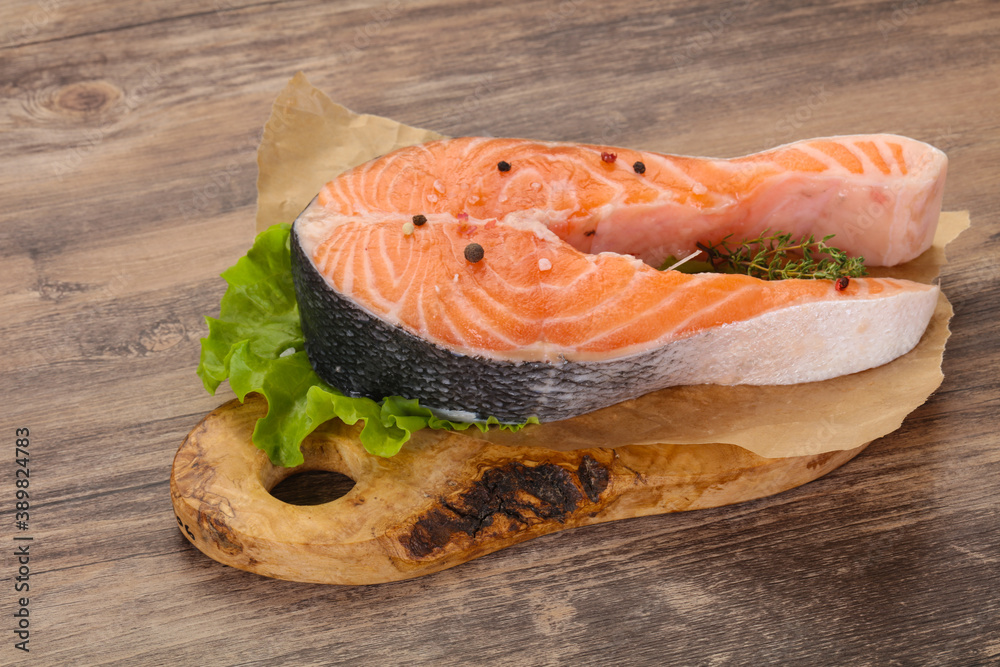 Raw salmon steak - ready for grill Raw salmon steak - ready for grill