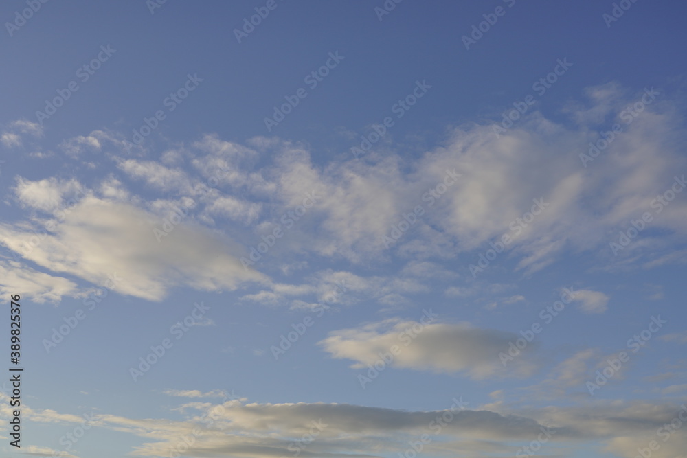 white cloudy blue background sky