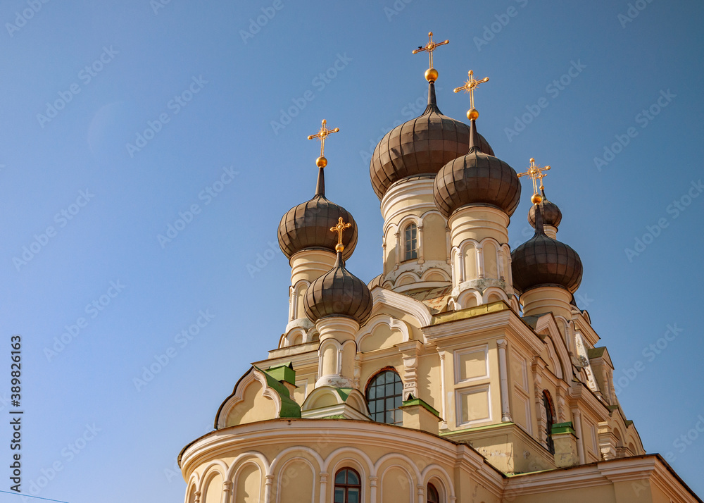 A large image of the black domes of the church of Shestakov icon of God's mother of the Georgian parish in St. Petersburg