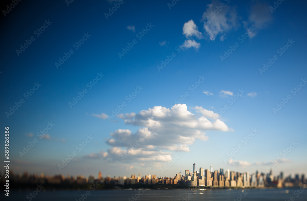 Tilt-shift lens distorted perspective view of New York City NYC Manhattan Downtown Skyline, viewed from Jersey City, New Jersey, USA.