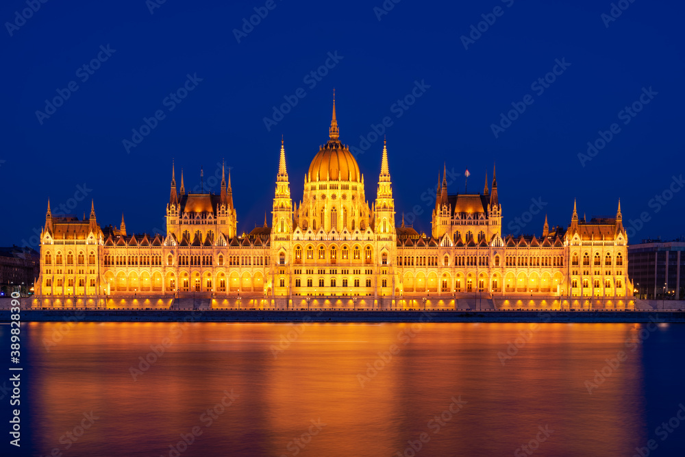 Budapest parliament on the Danube banks at dusk, Hungary