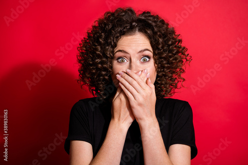 Portrait of attractive hairdo horrified people arms cover mouth speechless isolated on red color background