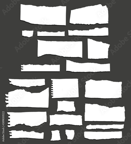 White ripped note, notebook paper stuck with sticky tape on black background.