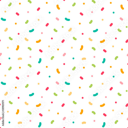 Vector seamless pattern background with bright colorful confetti, sprinkles, dots.