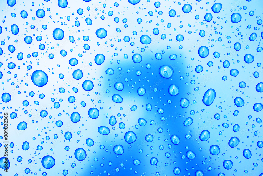 Big raindrops on blue and white background