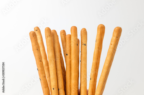 Sesame sticks on white background