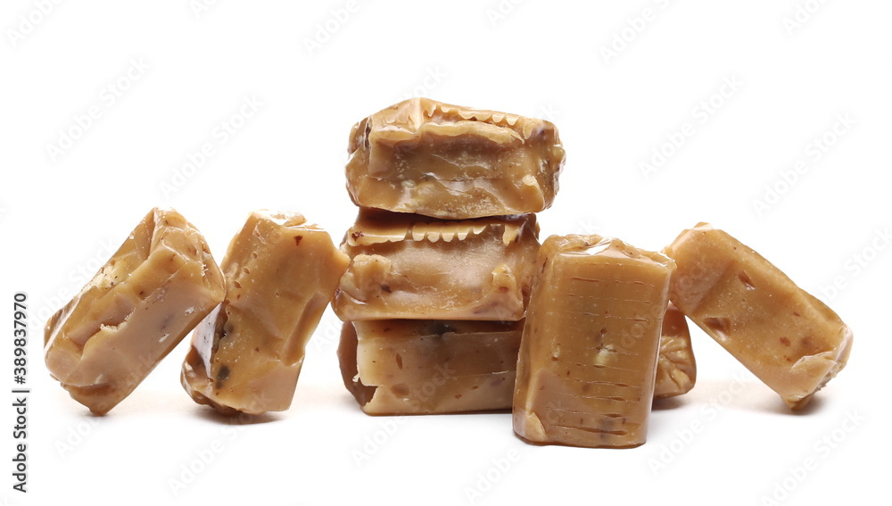 Caramel candies isolated on white background