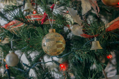 Decorative Christmas ball on the Christmas tree. Winter Photography 2020. 