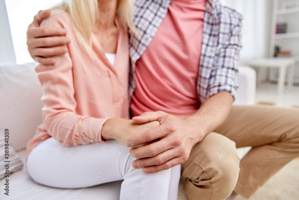 love, relationships and people concept - happy couple hugging at home love, relationships and people concept - happy couple hugging at home