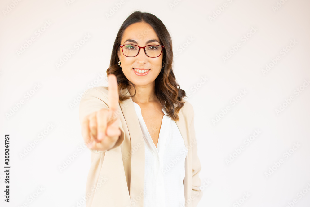 Portrait of a confident young woman showing stop gesture isolated over white background Portrait of a confident young woman showing stop gesture isolated over white background