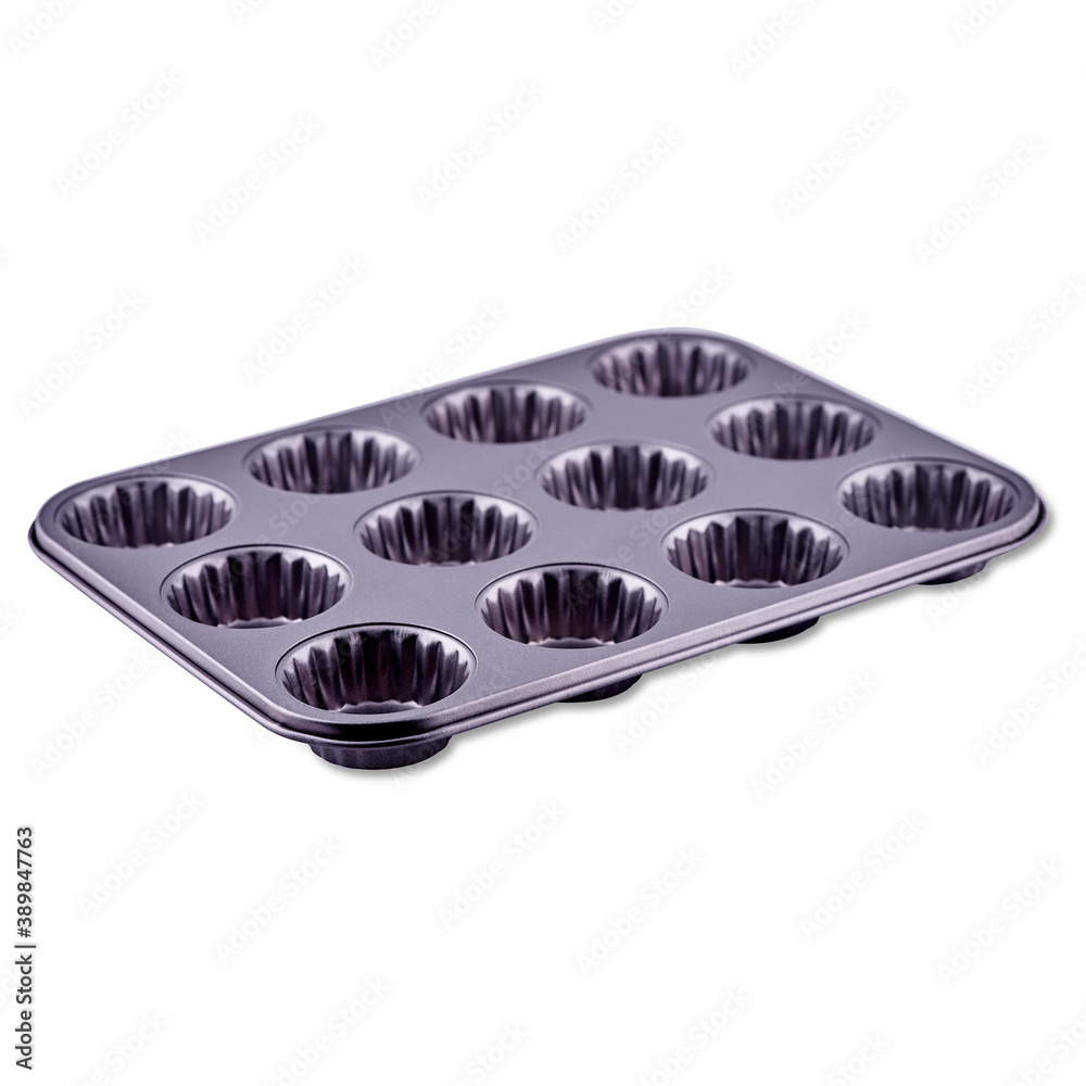 Cake form isolated on white background, copy space. Cake cup, metal mold, bakeware. Cake form isolated on white background, copy space. Cake cup, metal mold, bakeware.