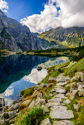 Morskie Oko  or Eye of the Sea in English  is the largest and fourth-deepest lake in the Tatra Mountains  in southern Poland.