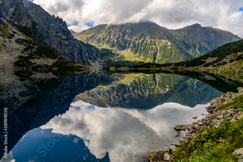Fototapeta Naklejka Na Ścianę i Meble -  Morskie Oko, or Eye of the Sea in English, is the largest and fourth-deepest lake in the Tatra Mountains, in southern Poland.