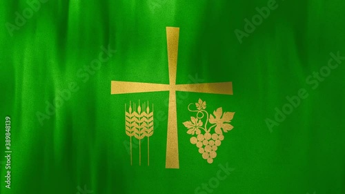 Holy Cross with Thanksgiving Symbols on Green Cloth. Looped wide 3D Animation conceptual shot of Christian liturgical background for online live video sermons and confessional religious content. photo