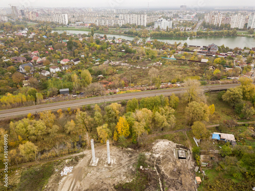 Aerial drone view. Railroad through the private sector in Kiev in autumn.