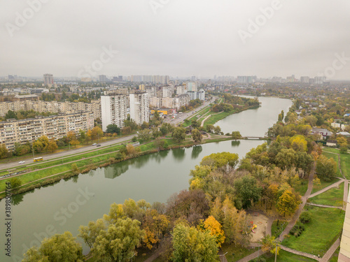 Aerial drone view. City lake in autumn.