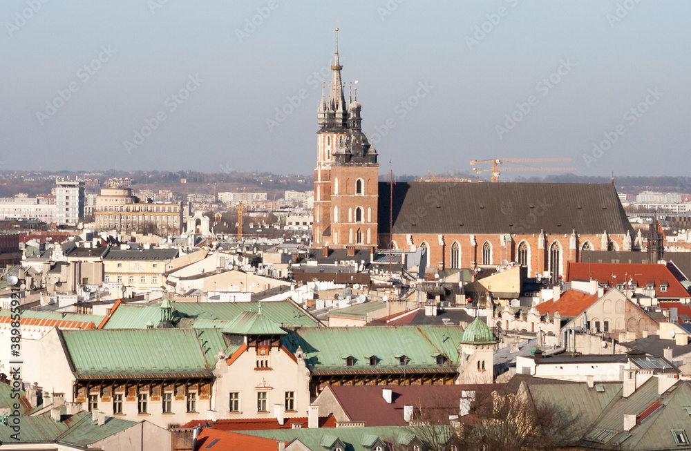 Krakow, Poland - February 17, 2019:  Tower of the church of St. Mary in Krakow seen from the window of the zygmunt bell