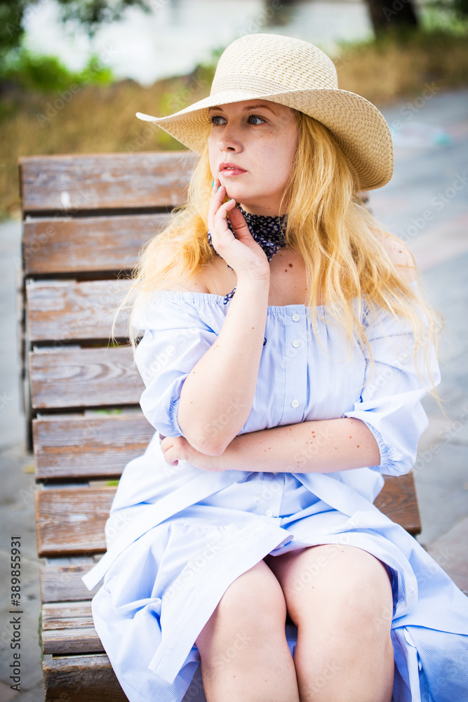 Fototapeta premium blonde in a blue dress