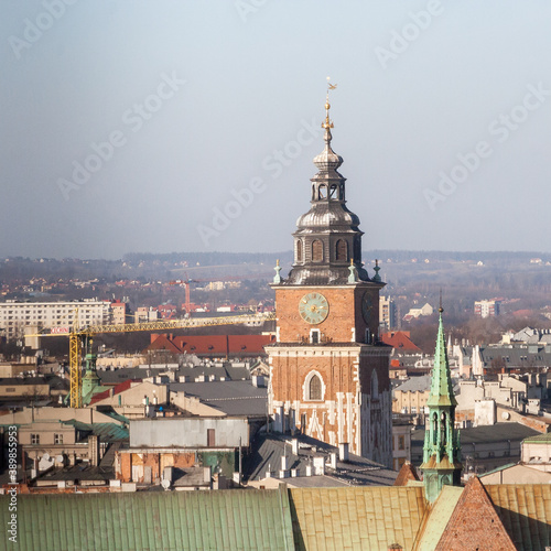 Krakow, Poland - February 17, 2019: Tower of the church of St. Mary in Krakow seen from the window of the zygmunt bell