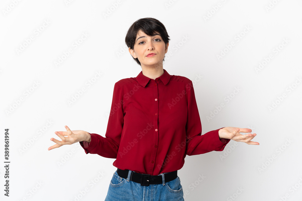 Woman with short hair isolated on white background having doubts Woman with short hair isolated on white background having doubts