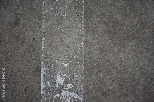 High quality texture of asphalt with weathered white stripe. P.S. Cigarettes and gums are not included! (300dpi, 6000x4000) 