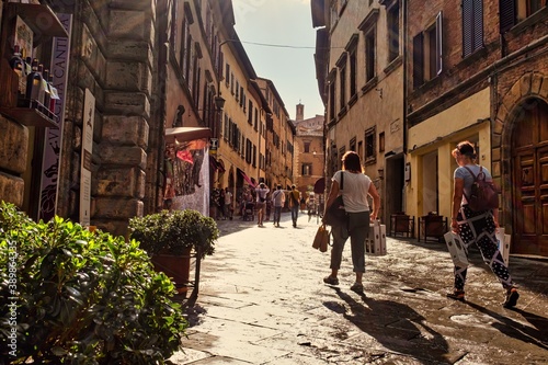Photography Montepulciano with Pedestrians Shopping on Ancient Street