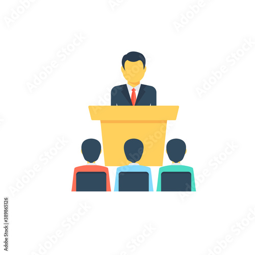 
A speaker giving lecture to attendees standing 
