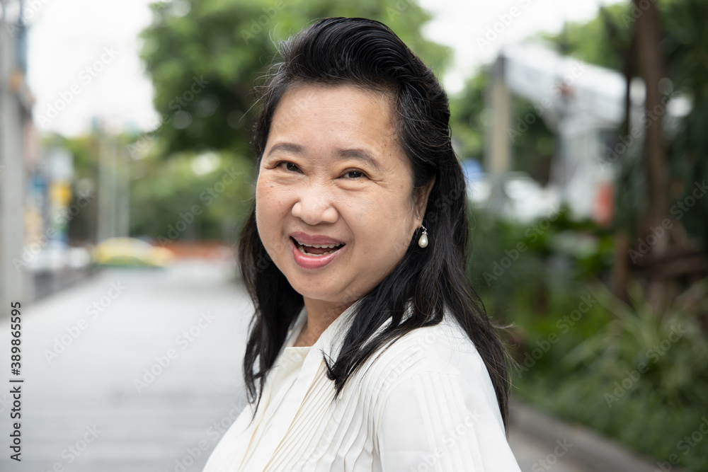 happy friendly asian old senior woman smiling at you happy friendly asian old senior woman smiling at you