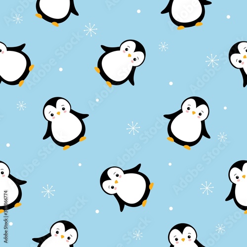The vector pattern with cartoon cute penguins and snowflakes on blue background
