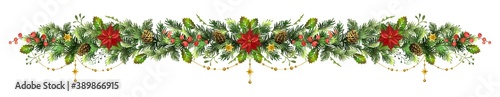 Long Christmas fir garland with poinsettia flower and red berries.