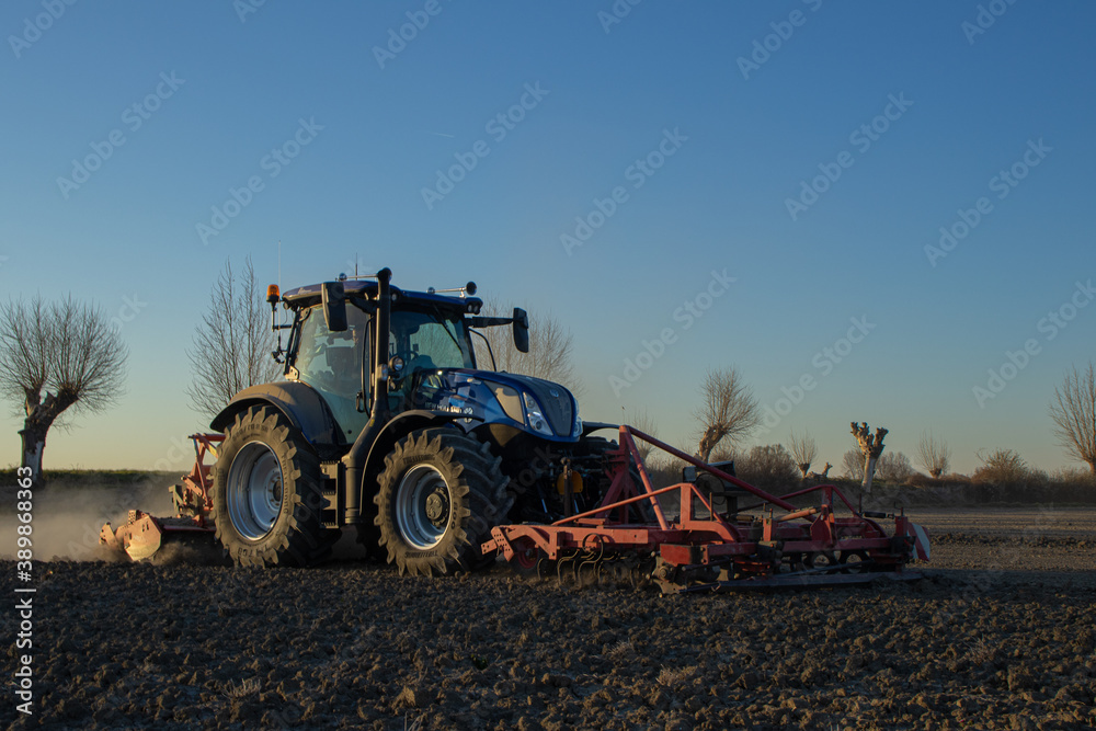 tractor in a field tractor in a field