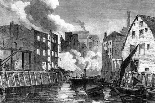 Scene of the fire at dockhead, Bermondsey, London, England. 1864. Antique illustration. 1867. photo