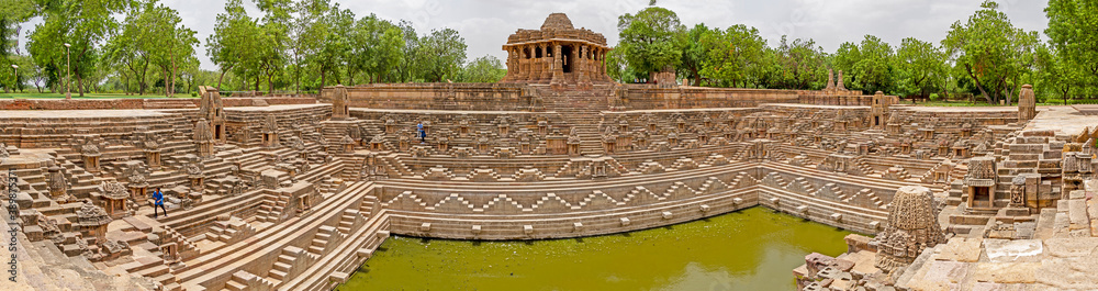 Photo is of flight of steps leading to Kunda or Reservoir located at Temple dedicated to the solar deity 'Surya' (Sun) at Modhera village of Gujarat State, India.Built around 1000 AD. Photo is of flight of steps leading to Kunda or Reservoir located at Temple dedicated to the solar deity 'Surya' (Sun) at Modhera village of Gujarat State, India.Built around 1000 AD.