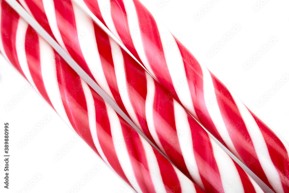 Fototapeta premium Christmas candy can isolated on a white. Red and white Christmas caramel.