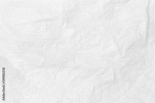 white crumpled paper texture background. White cloth texture crease the fabric