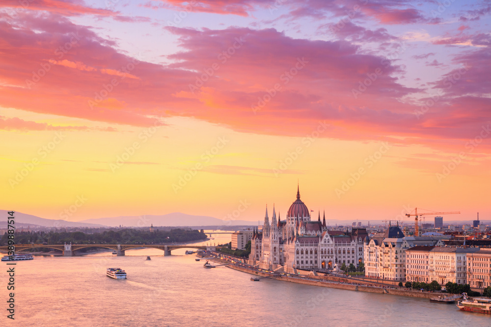 City summer sunset landscape - top view of the Hungarian Parliament Building and Danube river with Margaret Bridge in the historical center of Budapest, in Hungary