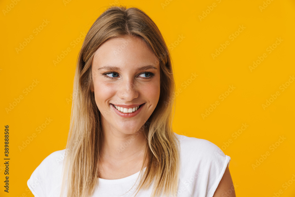 Cheerful beautiful girl smiling and looking aside Cheerful beautiful girl smiling and looking aside