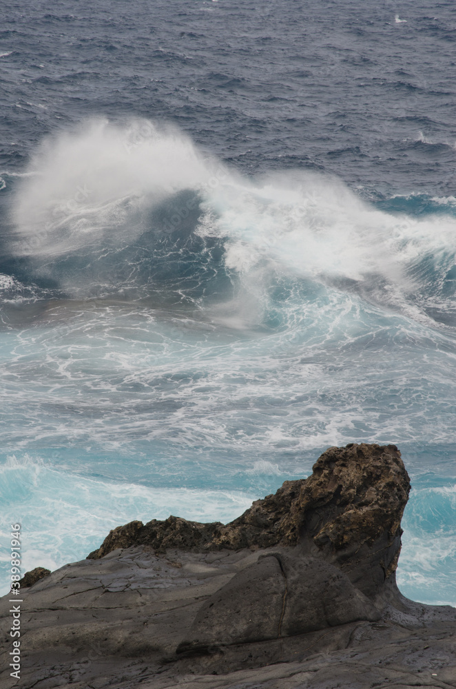 Wave breaking on the coast. Las Salinas. Arucas. Gran Canaria. Canary Islands. Spain.
